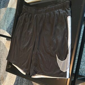 Nike Men's Black Shorts with White Swoosh